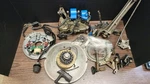 0581175 0320770 0581217 Evinrude 9.9 1975 Parts Lot Model 10R75C. Fixed Price $325.00.
