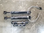 Mercruiser Alpha One Trim Cylinders 98703A3 98704A3 Stamped 98704-1. Fixed Price $175.00.
