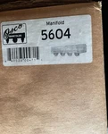 Osco Manifold, Part # 5604, Port 2B Merc Ford Log. Fixed Price $310.00.