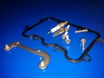 Bracket 437122 Seal 0337192 For Cover 0438614 15HP Johnson Evinrude. Fixed Price $22.00.