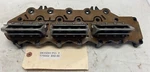 Johnson Evinrude Port Side Intake Manifold With Reeds Used From 1999 175HP (335). Fixed Price $50.00.